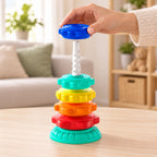 Adult holding the blue disc at the top of the spiral pole