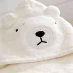 Lumiwee Puddle hooded baby bath towel: close-up of the polar bear hood face and ears