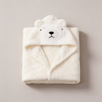 Lumiwee Puddle hooded baby bath towel: cream polar bear hooded baby towel on a plain background