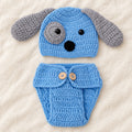 Blue and gray puppy crochet hat and diaper cover styled on ivory linen