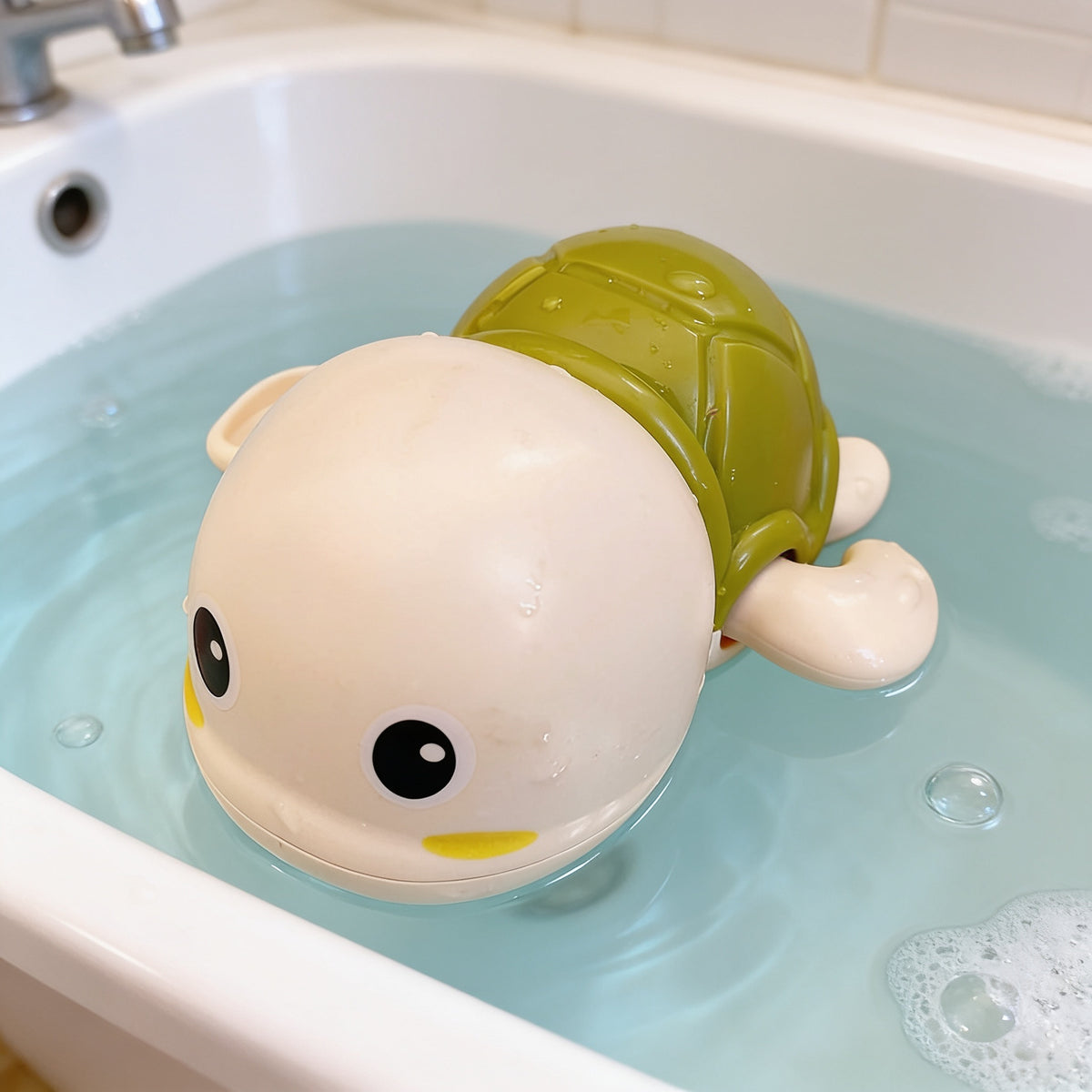 Lumiwee Ripple toddler bath toys, Green Turtle Swimmer option, in a bright room