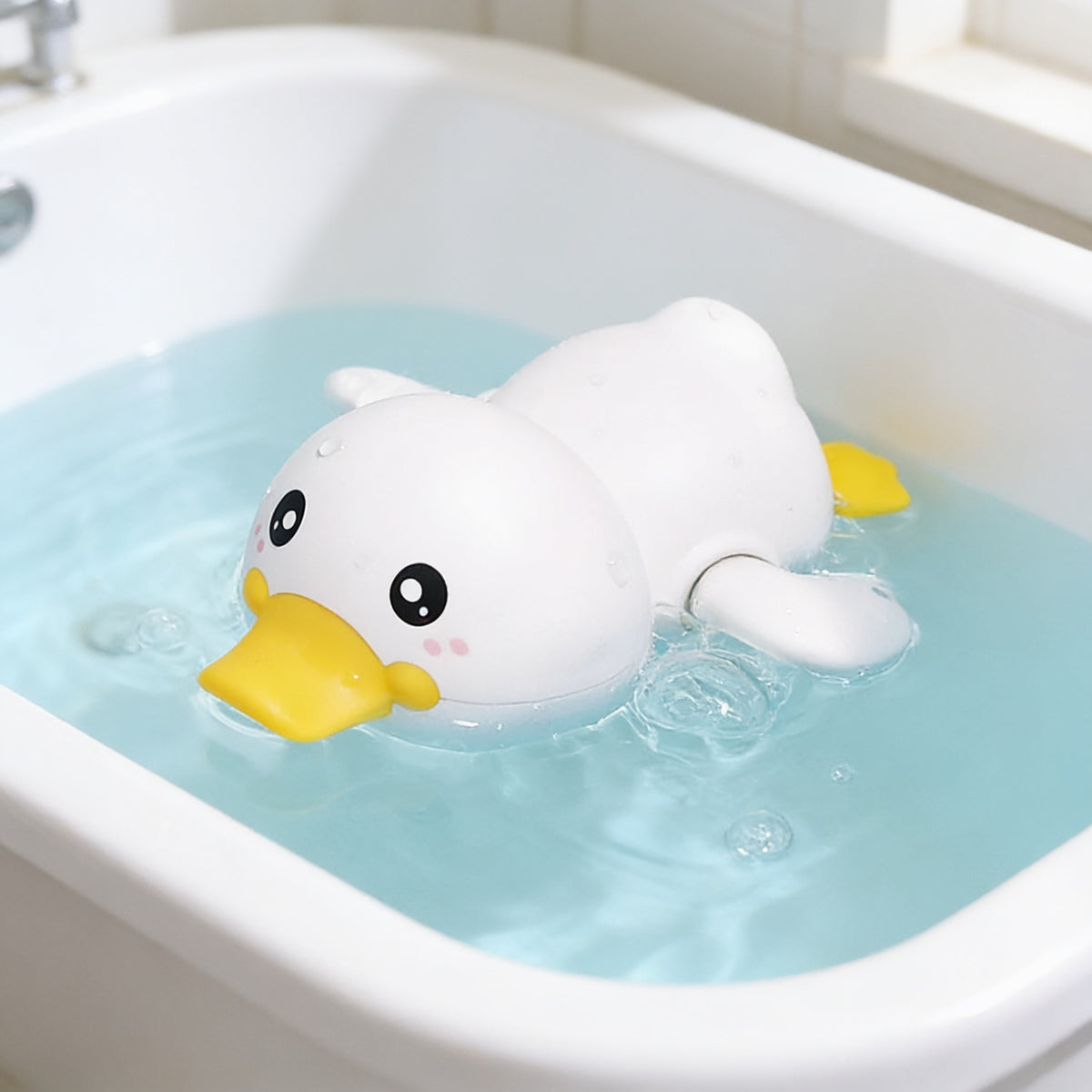 Lumiwee Ripple toddler bath toys, White Duck Swimmer option, in a bright room