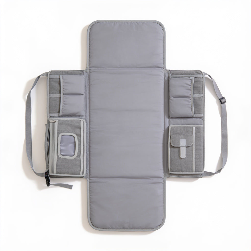 Lumiwee Robin portable changing pad: gray portable changing pad unfolded on a white background