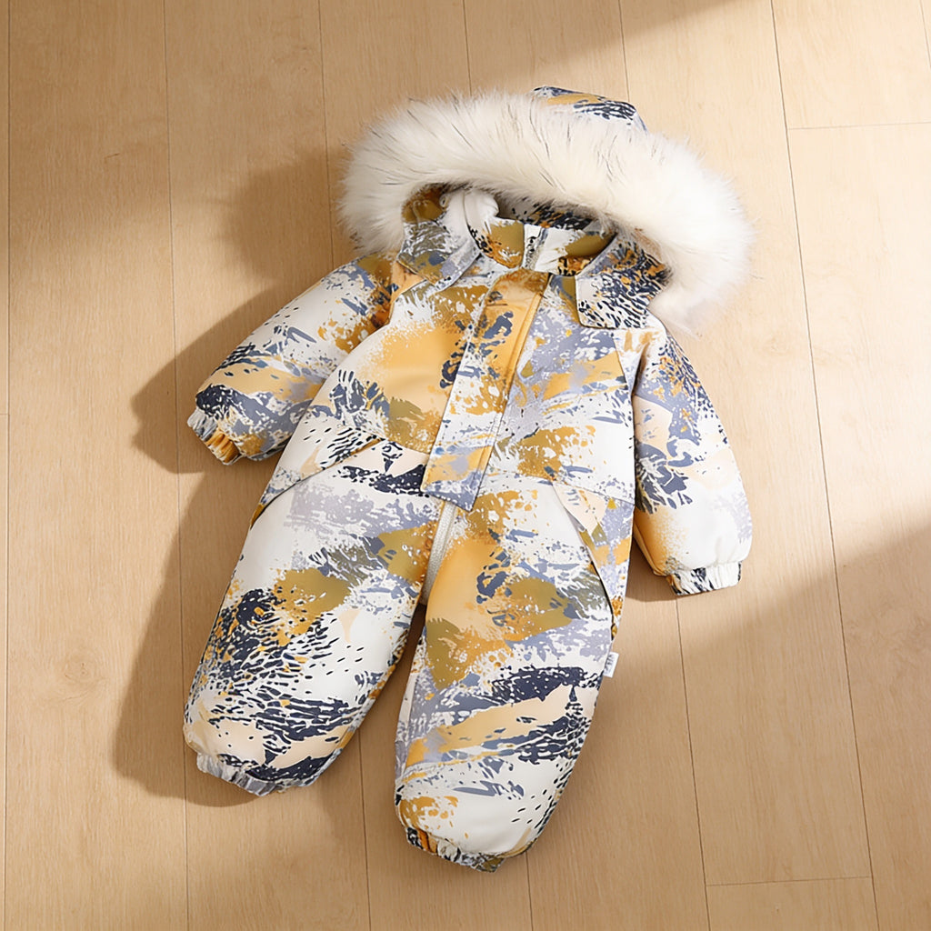 Lumiwee Snowdrop toddler hooded snowsuit: the painted waves snowsuit laid flat on a wood floor