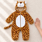 Lumiwee Snuggle complete leopard costume beside an adult hand for scale