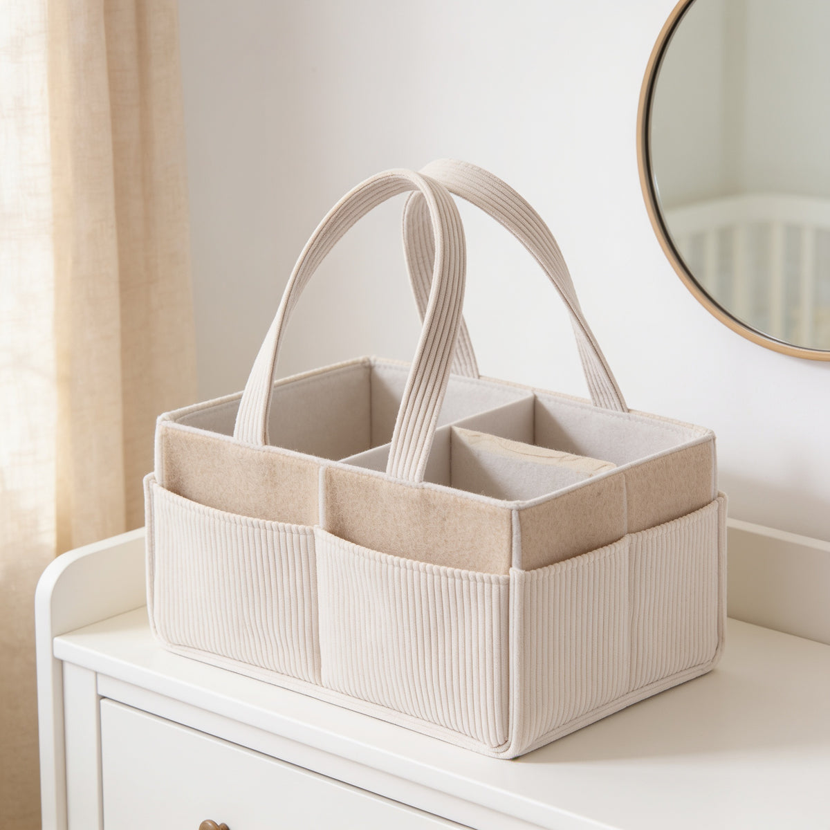 Lumiwee Sorrel corduroy diaper caddy basket: empty caddy showing its compartments and outer pockets