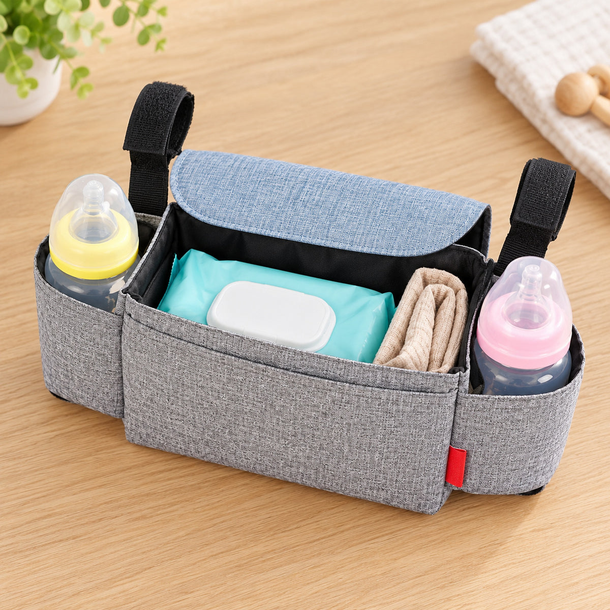 Sparrow caddy open to show its compartments and light walking essentials