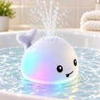 Spout whale fountain glowing aqua and lavender in a white basin