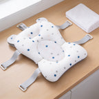 Lumiwee Starry baby bath support mat: the mat next to a folded hand towel for scale
