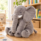 Gray Stomp elephant in three-quarter side view on the playroom floor