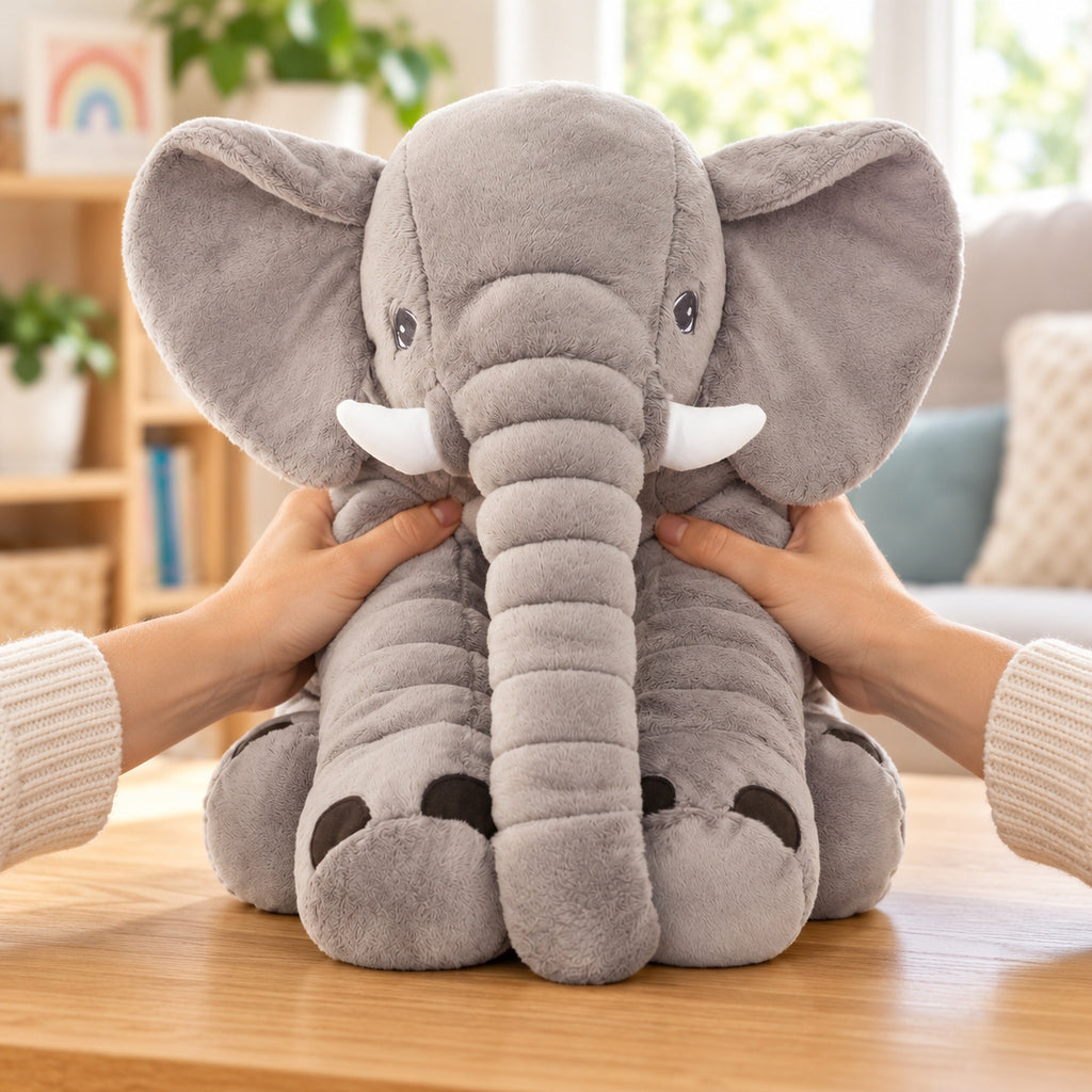Adult hands fluffing the gray Stomp elephant