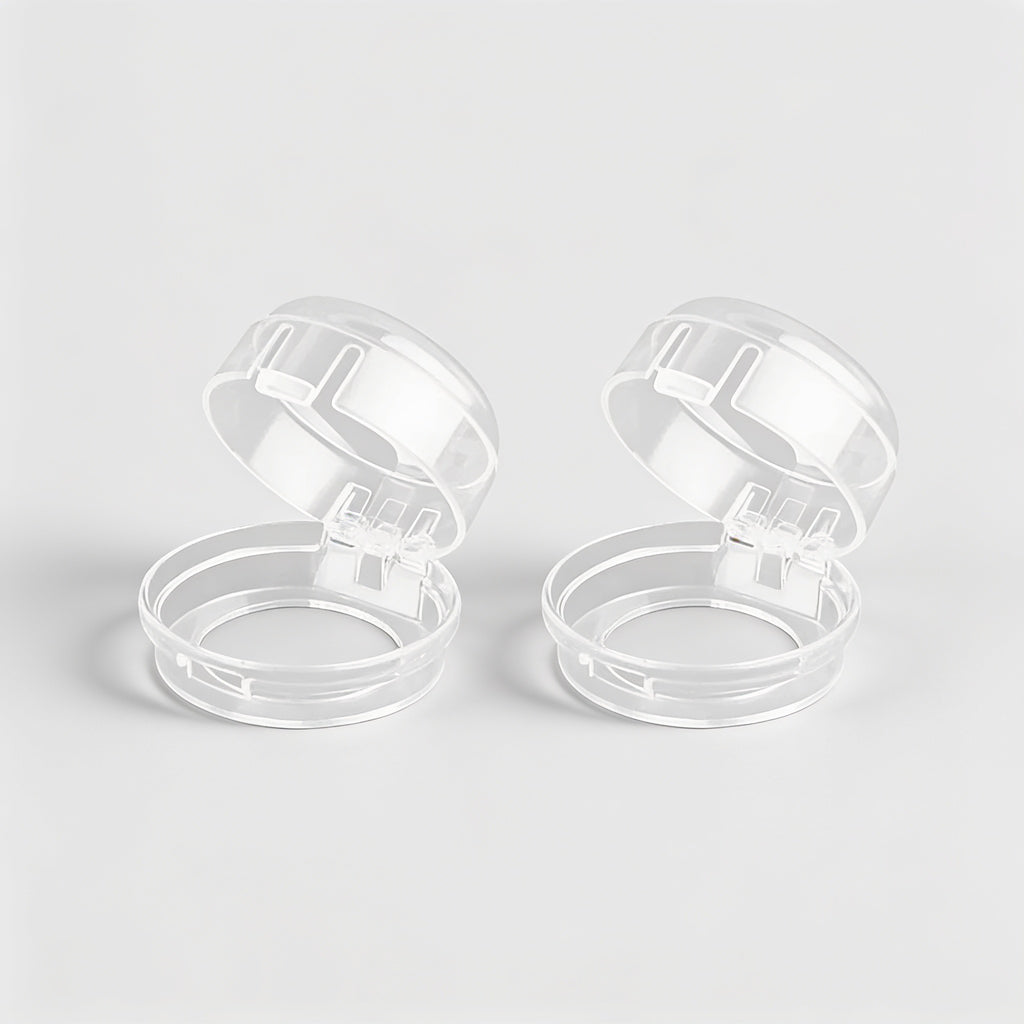 Lumiwee Stove knob covers: two clear stove knob covers on a plain background