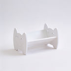 Lumiwee Sunny kids book rack: white smiley book rack on a white background
