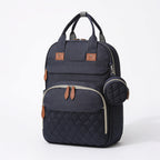 Lumiwee Swift diaper backpack: navy quilted diaper backpack on a white background