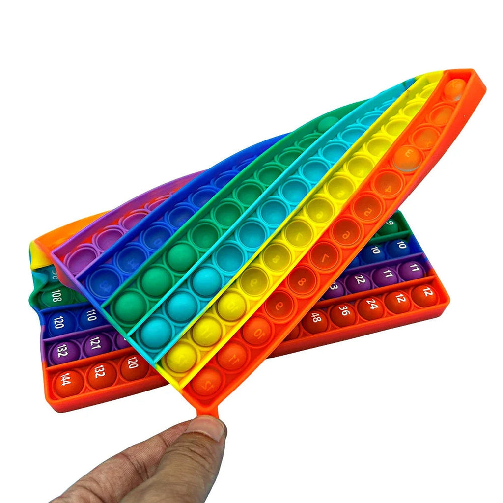 Original Tally board folded by hand to show flexible silicone and reverse side
