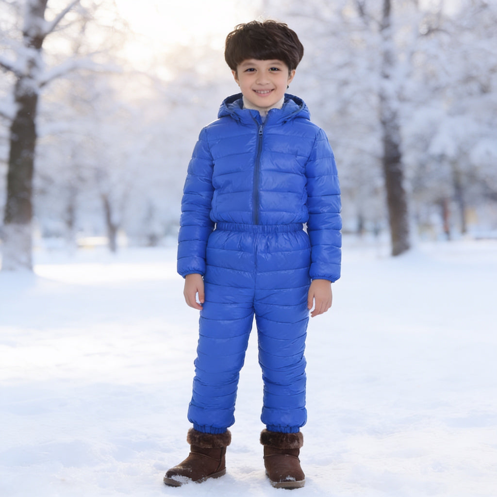 Lumiwee Tundra kids snowsuit set: child in the royal blue puffer jacket and pants set in the snow