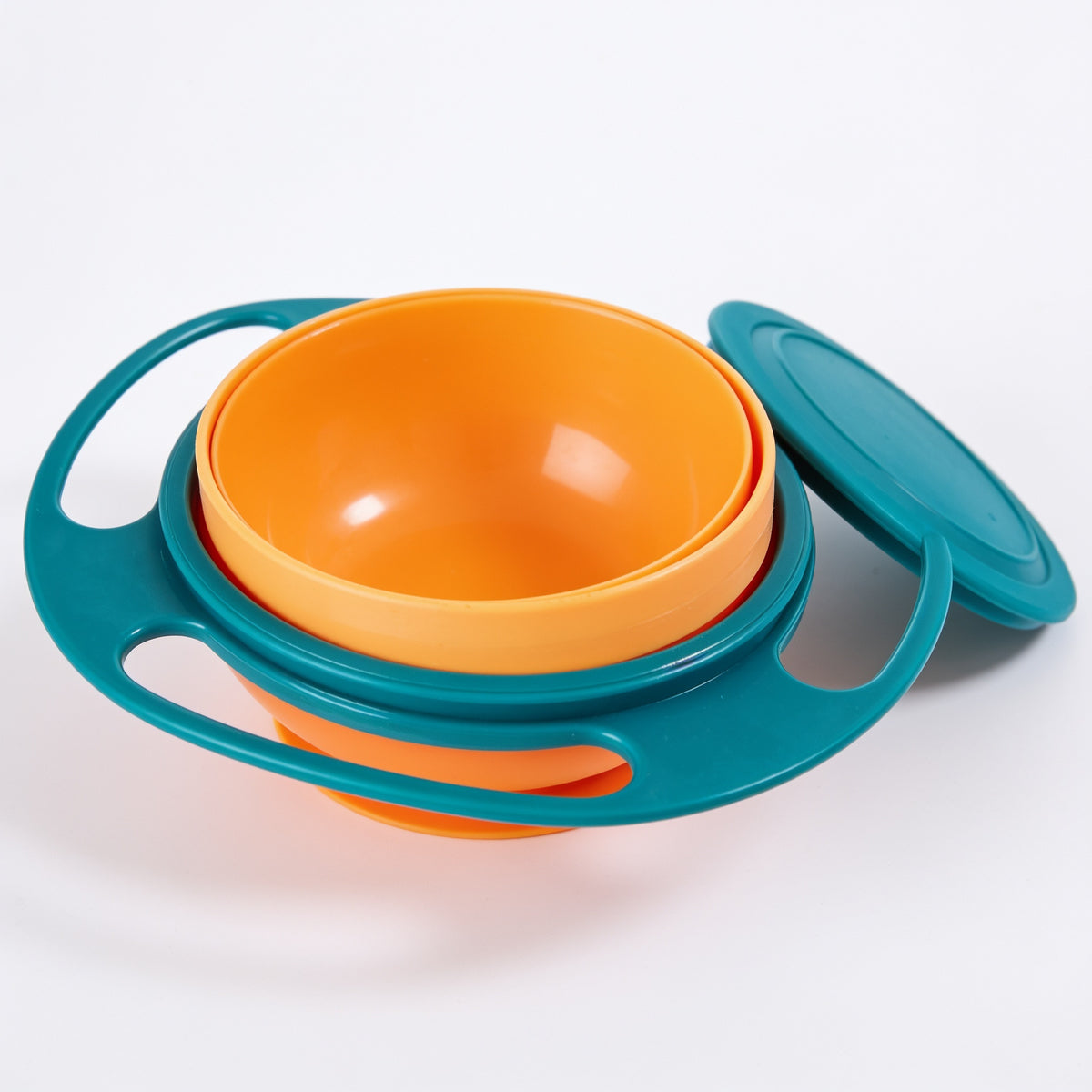 Lumiwee Twirl 360 rotating baby bowl: teal and orange rotating snack bowl with lid on a white background
