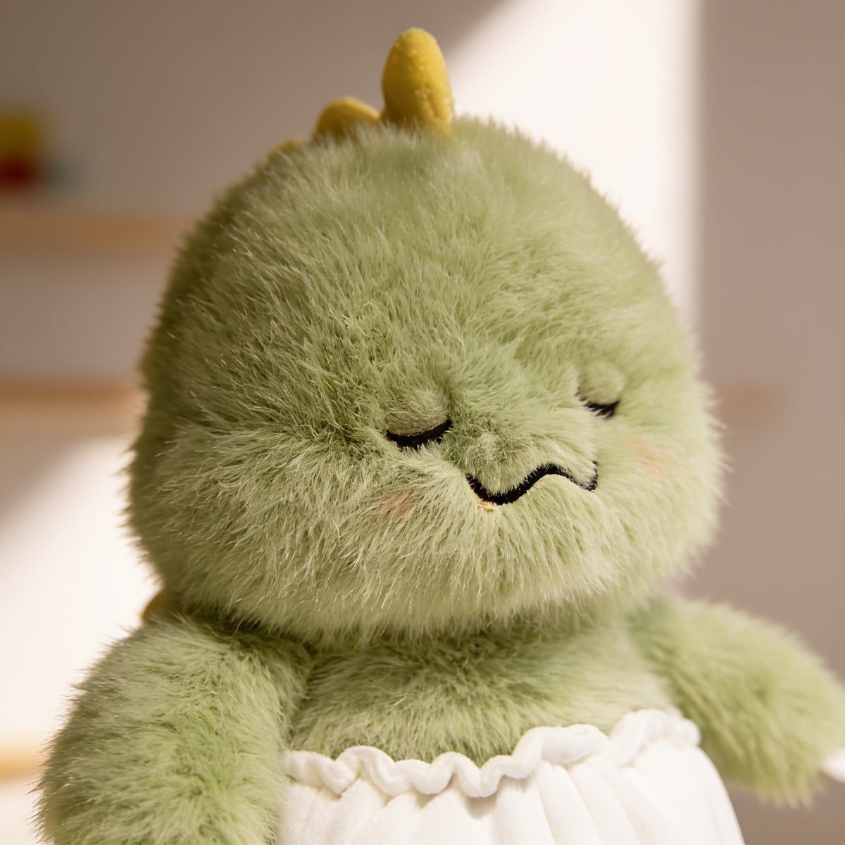 Lumiwee Waddle animal plush: close-up of the dinosaur plush fur and face